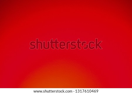 photo of glowing neon background in deep red duotone gradients/ 80's vibe background 