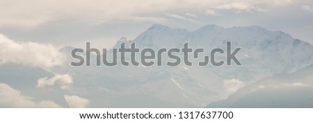 Panoramic view of snow-covered Sierra Nevada Mountain Range from the summit of Mammoth Mountain, Mammoth Lakes, California
