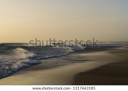 Conil de la Frontera beaches: perfect surfing weather, amazing waves creating a unique picture