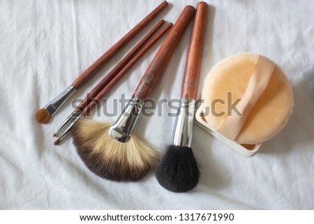 cosmetics and makeup products accessory placed on a white background,Concept: Women love beauty on facial,Top view of the collection for the new event