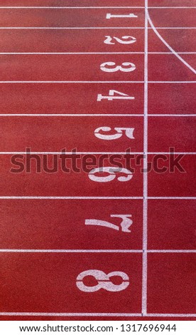 Running track with number. Red running track in stadium. rubber running tracks in outdoor stadium. 