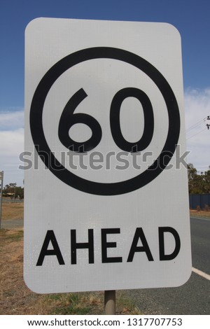 Sixty ahead road sign