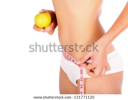 Young Woman With Apple and Measuring Tape.