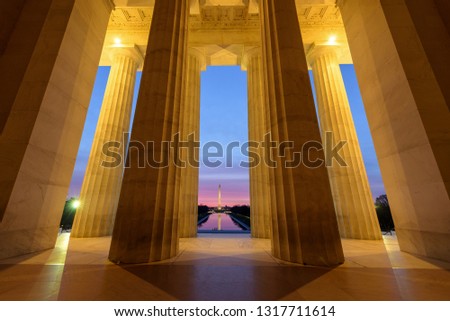 Wide angle view of Washington Monument with its reflection  from Lincoln Memorial at Sunrise, Washington DC