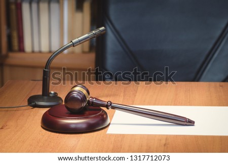 Symbol of judge and justice. Fair and legitimate decision. Judge's gavel  wooden table. Concept of law. Court, lawmakers and law. Bidding at auction. Royalty-Free Stock Photo #1317712073