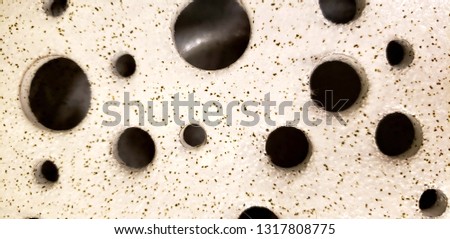 ceramic circles with a speckled pattern