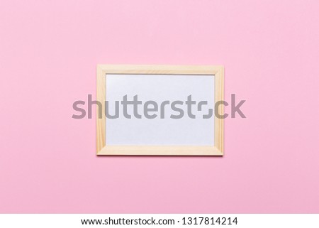 skandinavian blank frame on a pastel pink background