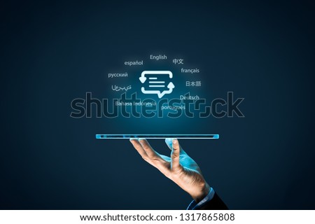 Translator app, language course and e-learning concept. Person with digital tablet, symbol of translation (speech bubble with arrows and abstract text) and top ten internet users languages. Royalty-Free Stock Photo #1317865808