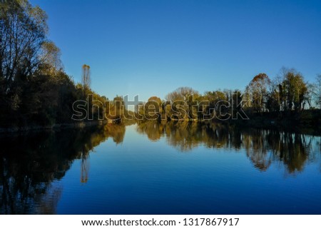 reflection of trees in the water, digital photo picture as a background