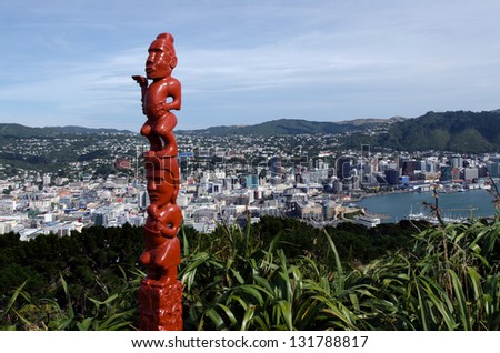 An ancient Maori sculpture of man and a woman mad out of wood on top of Mt Victoria in Wellington, New Zealand. Royalty-Free Stock Photo #131788817