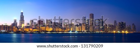 Downtown Chicago across Lake Michigan at sunset, IL, USA Royalty-Free Stock Photo #131790209
