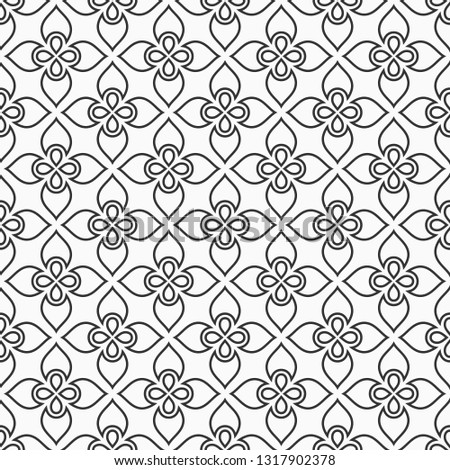 Vector seamless ornamental pattern. Arabian style. Floral motif. Modern stylish texture. Floor tiles. For fabric, textile, wallpaper, packaging, interior. Geometric monochrome background.