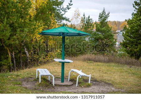 canopy in the form of a mushroom, with benches, for rest