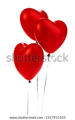 Air Balloons. Bunch of red heart shaped foil balloons