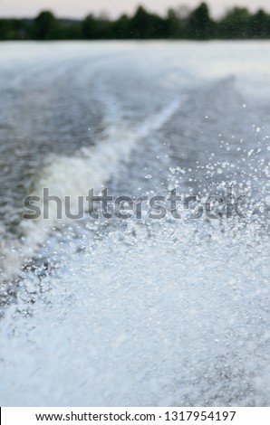 Splashes of water on the Volga river on a summer day