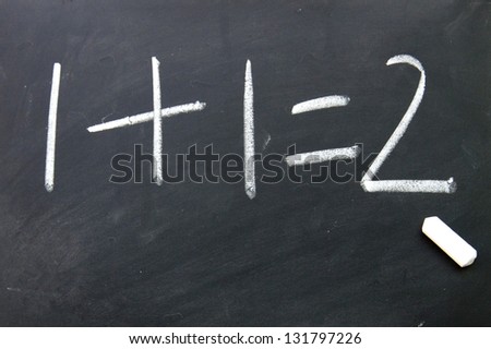 1add 1=2 written with chalk on blackboard Royalty-Free Stock Photo #131797226