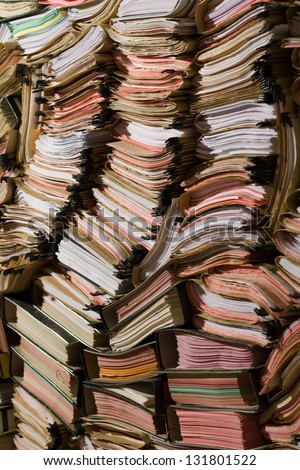 Stack of documents, papers and full binders Royalty-Free Stock Photo #131801522