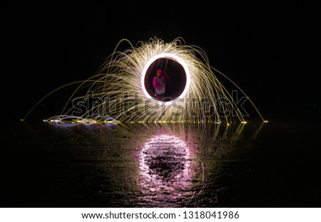 Created light painting pattern using fireworks this was done using long exposure night photography.