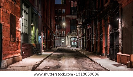Dark street in New York at night Royalty-Free Stock Photo #1318059086