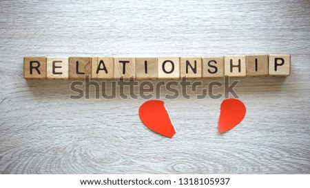 Relationship word on wooden cubes, broken heart concept, break up, divorce