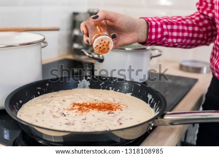 Women preparing meal in the kitchen. Food concept