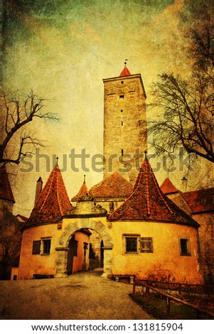 vintage style picture of an old castle gate of Rothenburg ob der Tauber in Germany