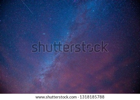 Colorful night dark sky with stars milky way planes and satellites