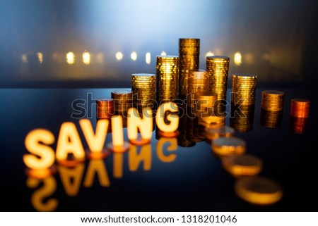 Coins arrows with a SAVING word for finance and business concept, saving money concept.