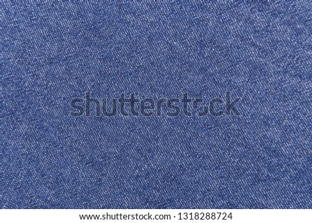 Blue jeans surface texture background,
