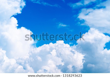 Blue sky with white clouds. Beautiful sky background. Clear day and good weather.