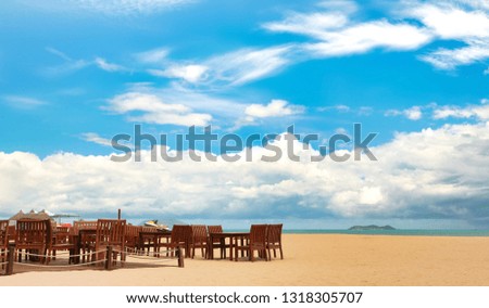 Beautiful view of the deserted beach, the sea and the blue sky on the island of Hainan.