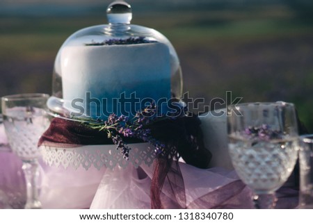 festively served table with lavender bouquets