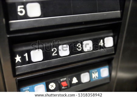 Buttons in elevator to select which level and floor you wish to ride to