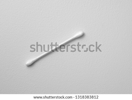Q-Tip Cotton Swab on White Background
