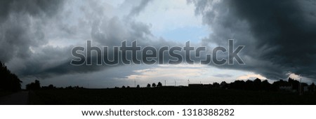 Panoramic view of dark dramatic sky before thunderstorm. Bubenorbis. Baden-Wurttemberg. Germany.