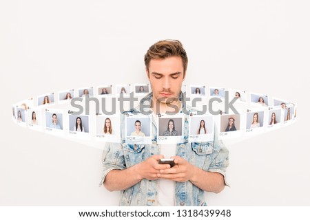 Close up photo interested he him his guy hold smartphone addicted online sit internet pick choose choice illustration pictures girls dating site futuristic creative design isolated white background