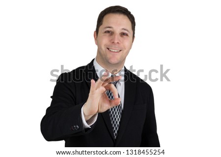 Businessman in Black Suit Doing Ok Sign. Isolated On White Background