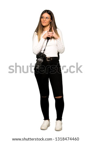 Full body of Young photographer woman scheming something