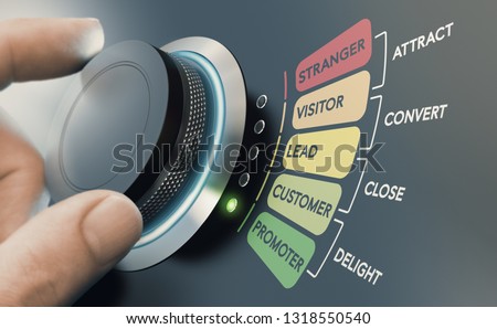 Man turning knob with different stages of sales process to convert strangers into promoters. Successful inbound marketing campaign concept.  Royalty-Free Stock Photo #1318550540