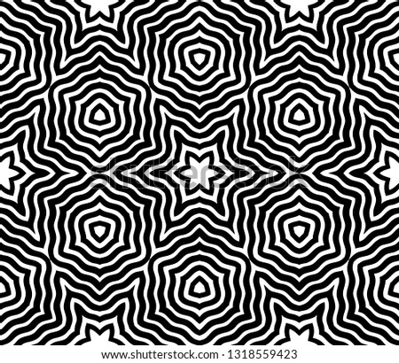 Abstract seamless pattern with modern ornamental design of black and white shades