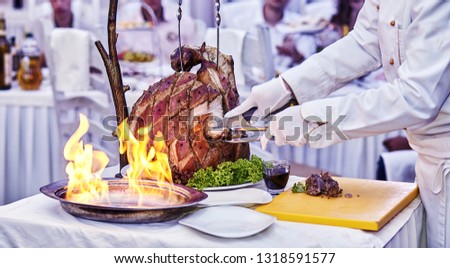 appetizing grilled meat on fire close-up. beautiful presentation of the dishes in the restaurant