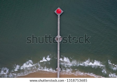 Aerial Shot of the Huntington Beach Pier in California with the beach