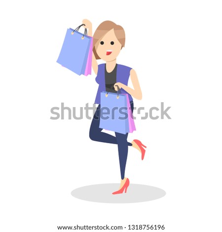 Woman carrying shopping bags with purchases