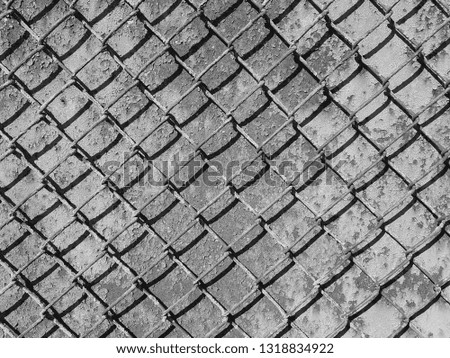 Rusty iron grid dirty surface black and white industrial background