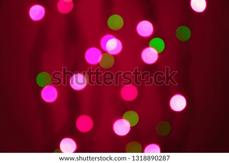 abstract blurred lights on background in pink and  green - christmas celebration concept