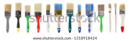Set of different clean paint brushes on white background Royalty-Free Stock Photo #1318918424