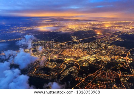 Beautiful aerial cityscape view of the city of Leiden, the Netherlands, after sunset at night in the blue hour Royalty-Free Stock Photo #1318933988