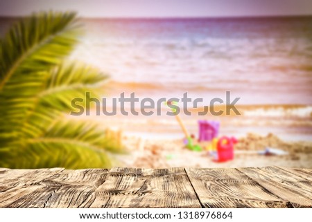 Desk of free space and summer time on beach. 