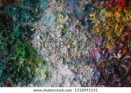 Palette with mixed dried paints