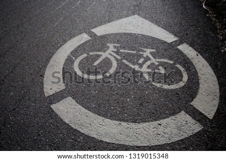 Bike path. Bicycle road sign painted on the pavement. Bicycle lane,Bicycle sign on the road